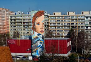 V Praze Řepích vznikl mural s dívkou a volavkami